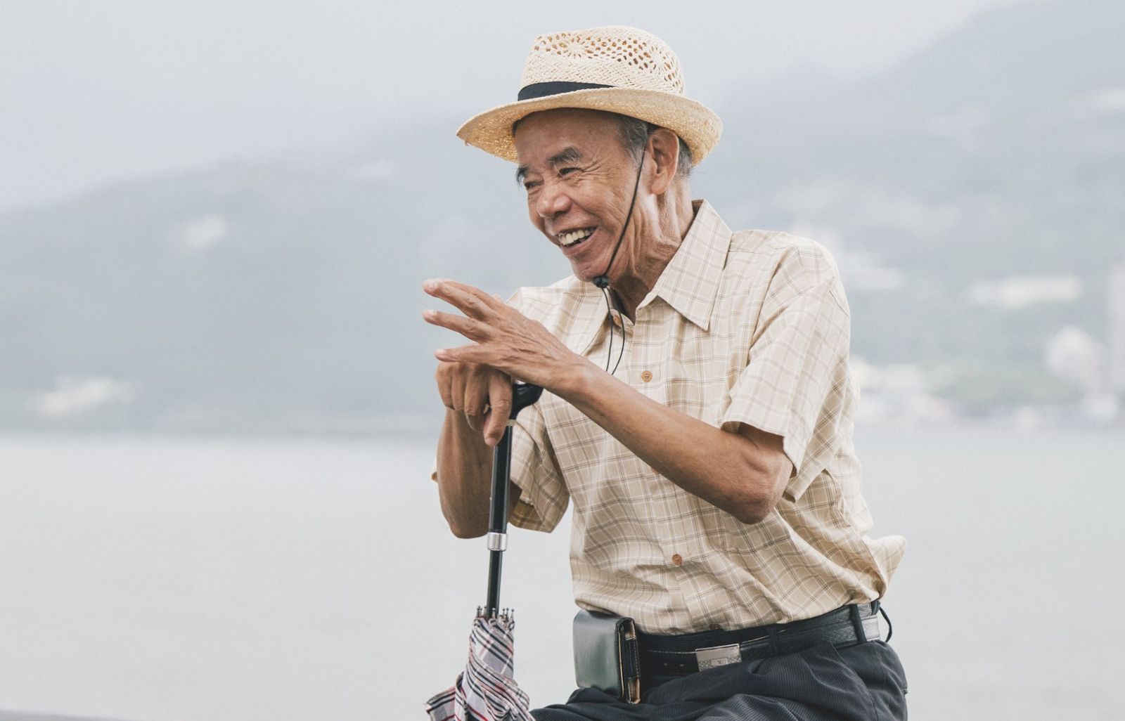 高齡視障者，吳勝雄，83歲